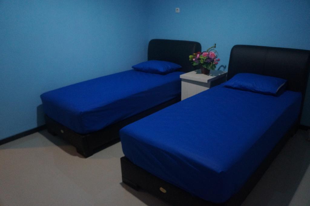 מאלאנג Budget Guest House Tunas Mandiri Jaya חדר תמונה